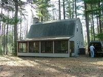 Cabin in the Woods. Located near Tustin, MI 49688.